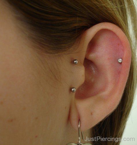 Lobe Dual Tragus And Helix Piercing
