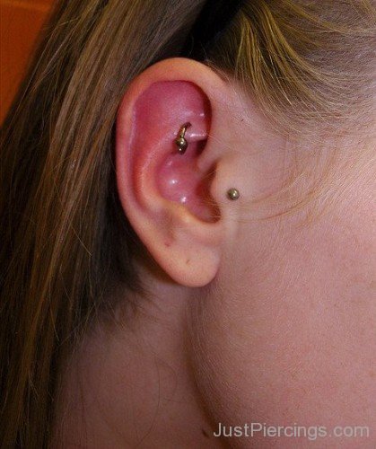 Rook And Tragus Piercing