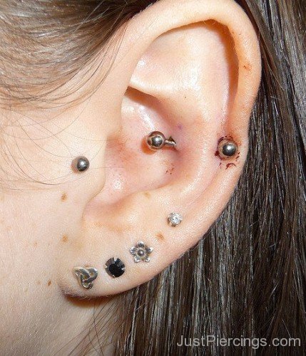 Rook Tragus And Lobe Piercing