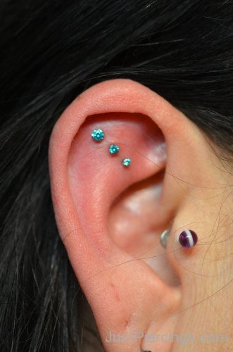 Triple Helix And Tragus Piercing