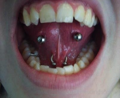 Web Tongue And Venom Piercing