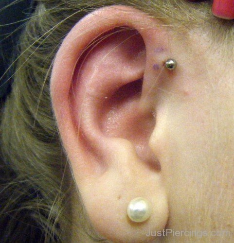 White Lobe And Helix Piercing