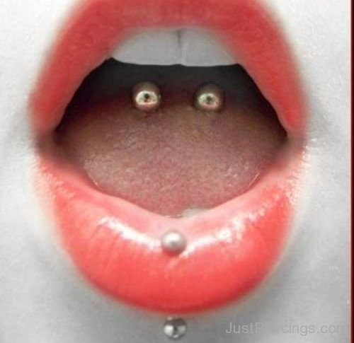 Awesome Vertical Labret And Tongue Piercing