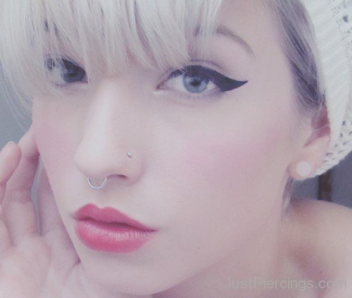 Nostril And Septum Piercing