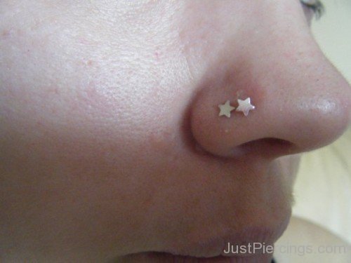 Nostril Piercing With Two Stars
