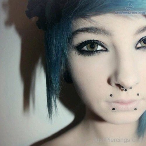 Septum Nose And Canine Bites Piercing