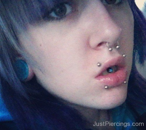 Septum Tongue And Canine Bites Piercing