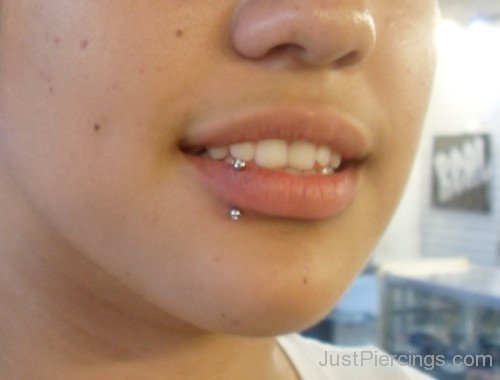 Side Lip Vertical Labret Piercing