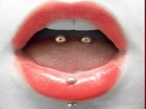 Tongue And Vertical Labret Piercing