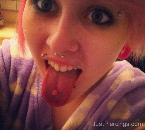 Tongue Eyebrow,Septum And Canine Bites Piercing