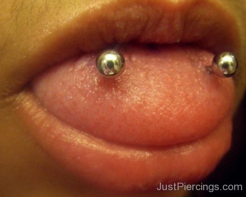 Tongue Piercing With Silver Barbell