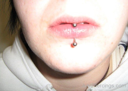 Vertical Center Labret Piercing With Silver Barbell