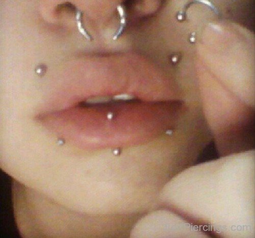 Vertical Labret And Canine Bites Piercing
