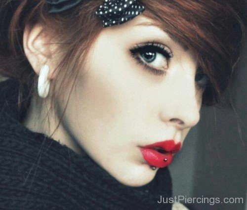 Vertical Labret Piercing On Red Lips