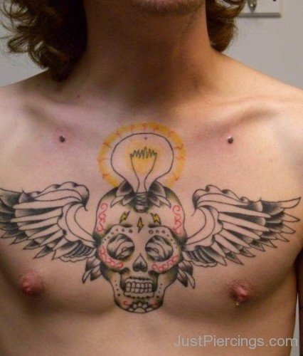 Winged Bulb Skull Tattoo And Collarbone Piercing