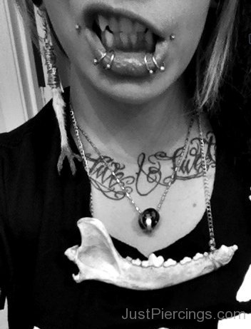 Angry Girl With Shark Bites And Dahlia Bites Piercing