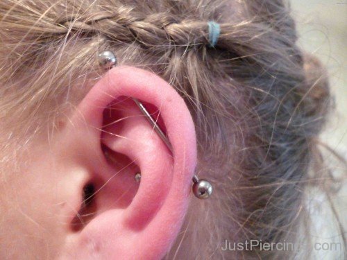 Conch And Scaffold Piercing