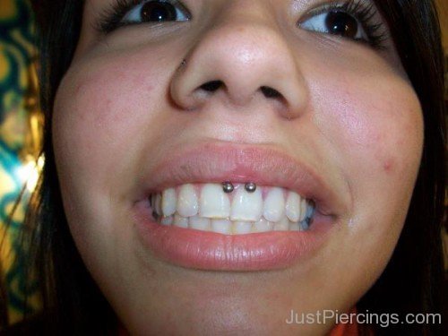 Girl Showing Smiley Piercing