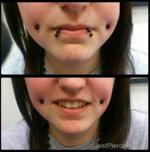Girl With Dimple Cheek Piercing And Shark Bites