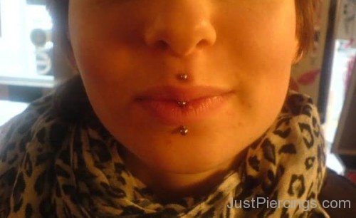 Girl With Labret And Jestrum Piercing