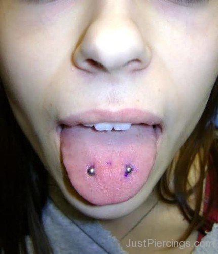 Horizontal Tongue Piercing With Silver Surface Barbell