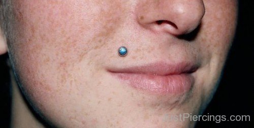 Madonna Piercing With Blue Stud