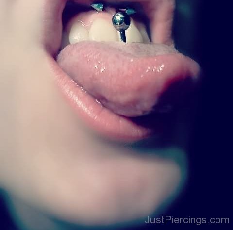 Mouth Piercing Frowney And Tongue Piercing