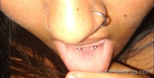 Nose And Frowney Piercing