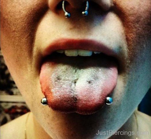 Septum And Horizontal Tongue Piercing