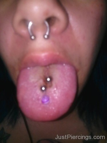 Septum And Multiple Tongue Piercings