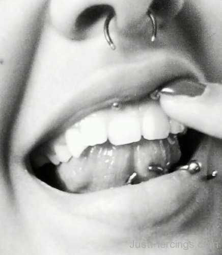 Septum Smiley Lower Lip And Web Tongue Piercing