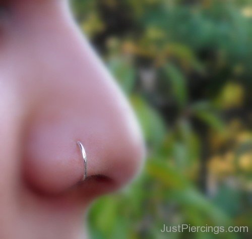 Silver Hoop Nose Piercing