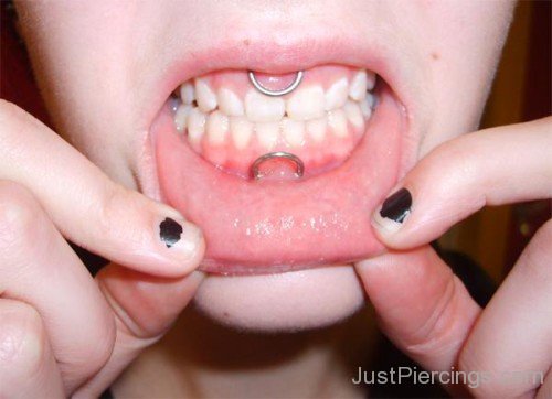 Smiley And Frowney Piercing