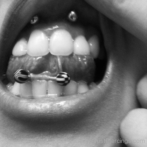 Smiley And Web Piercing