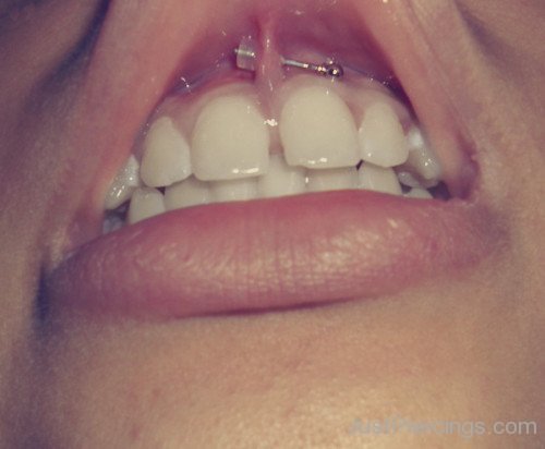 Smiley Piercing With Long Barbell