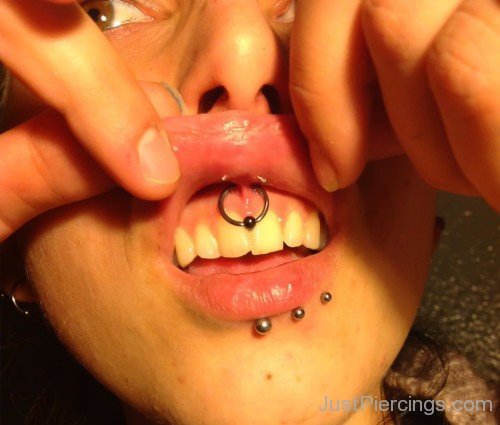 Smiley,Labret And Snake Bite Piercings