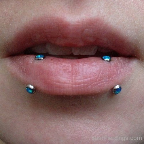 Snake Bites Piercing With Blue Studs