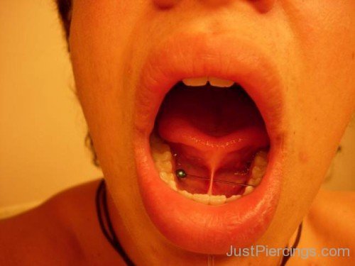 Tongue Frenulum Piercing With Long Barbell