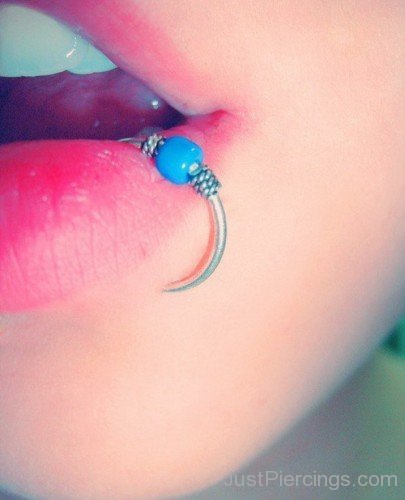 Blue Rings Lip Piercing