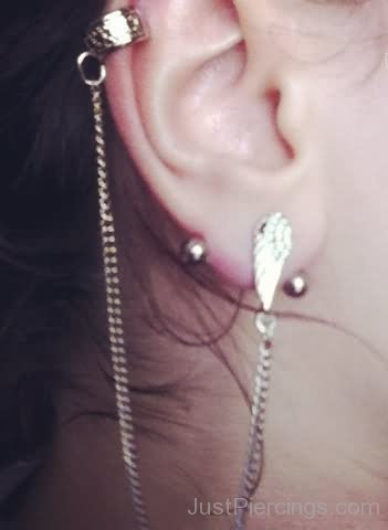 Cartilage To Lobe Chain And Lobe Transverse Piercing