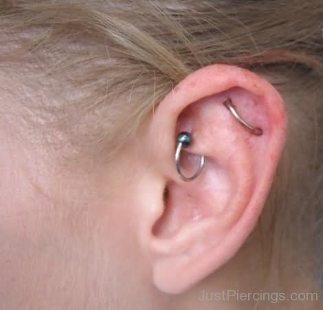 Daith And Orbital Piercing On Girl Left Ear