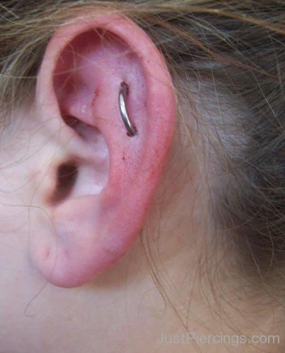 Girl Left Ear Orbital Piercing Picture
