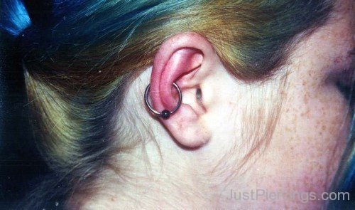 Girl Right Ear Conch Orbital Piercing