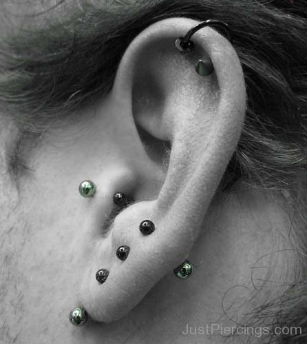 Helix Lobe And Tragus Piercings