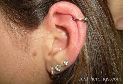 Helix Piercing With Golden Ring