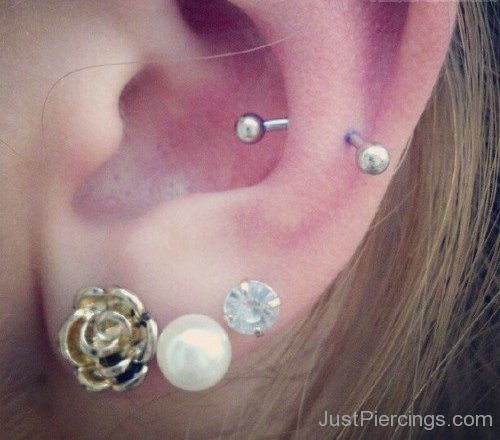 Helix Snug And Triple Lobe Piercing With Flower And White Stud