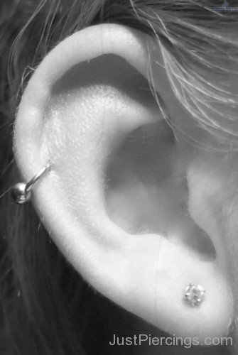Lobe And Pinna Piercing With Ball Ring