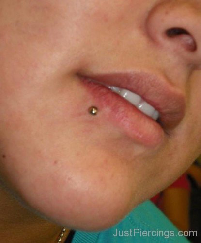Lower Lip Piercing With Gold Stud