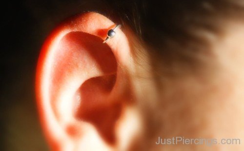 Right Ear Pinna Piercing With Silver Bead Ring