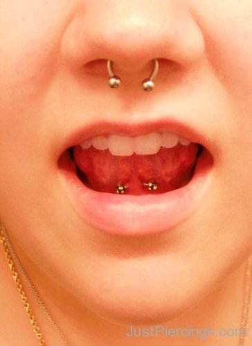 Septum And Web Tongue Piercing